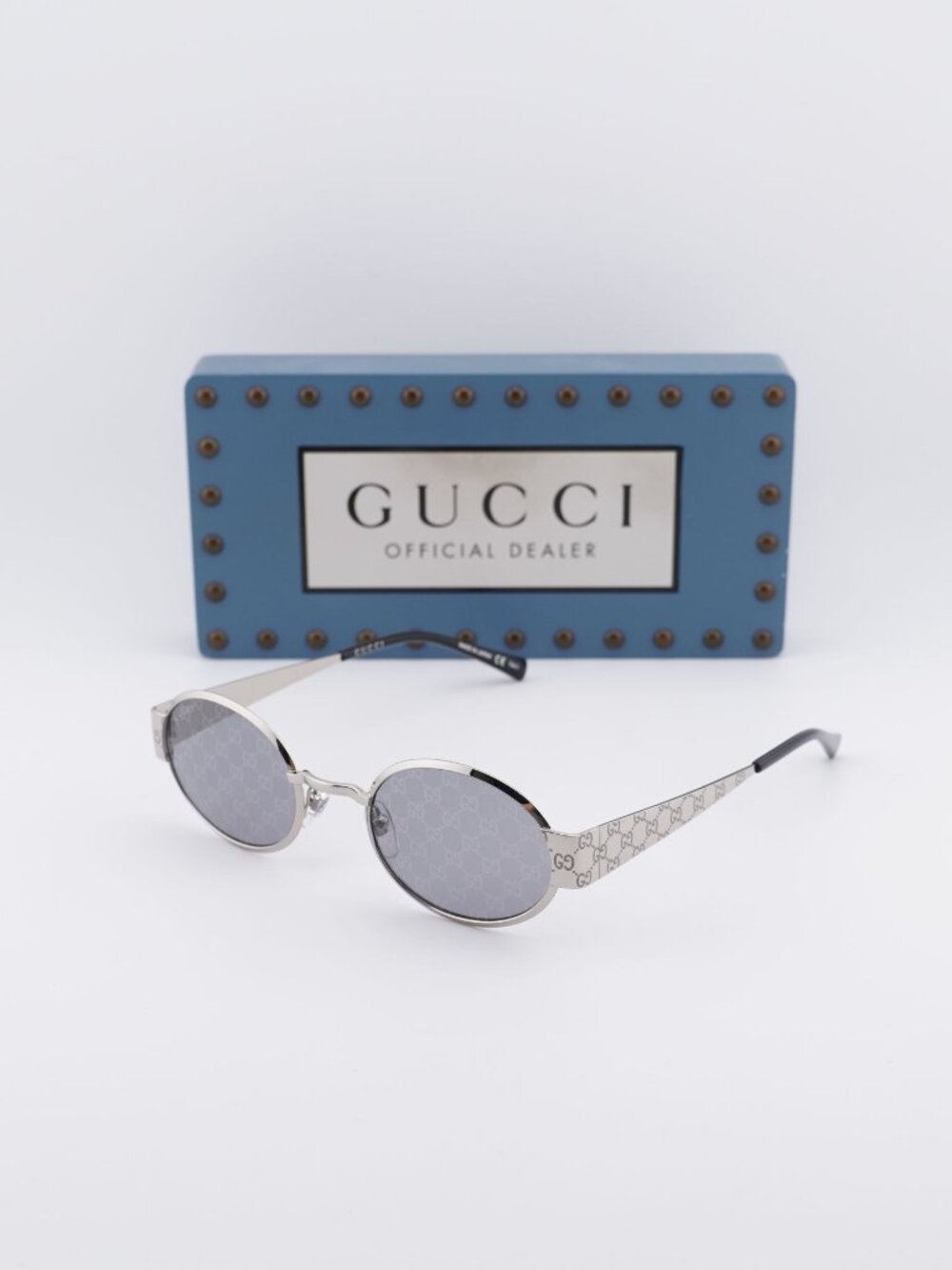 Gucci GG1854S 002 Oval Sunglasses – Silver / Grey
